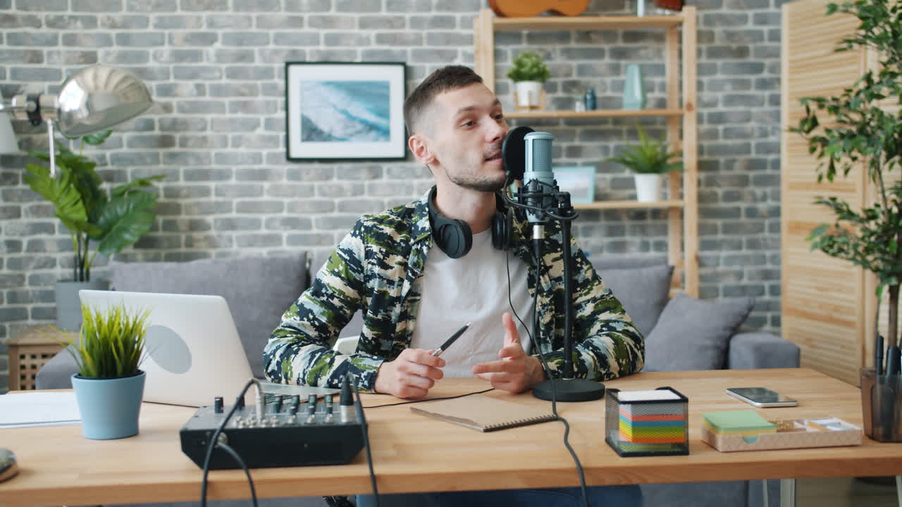 Man Recording a Podcast or Interview in a Home Studio