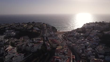 sunset in small village carvoeiro in portugal, tourist destination for vacation, aerial