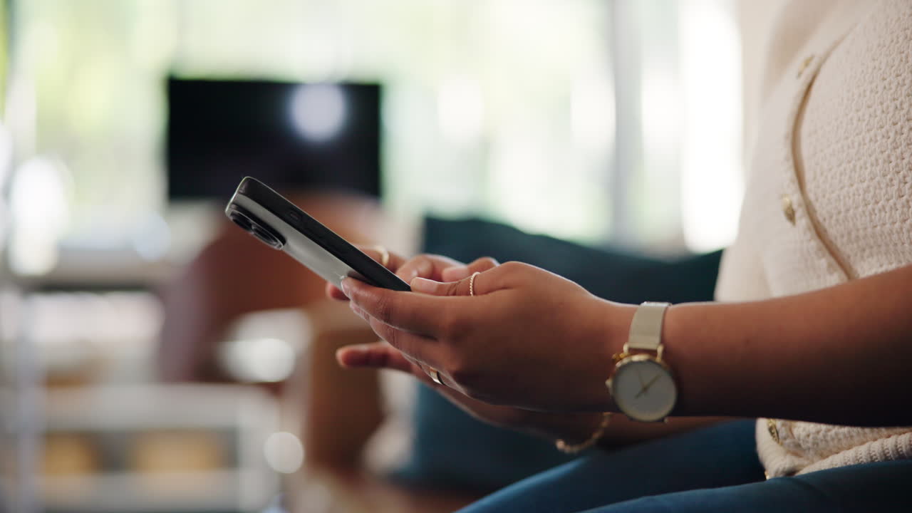 Close Up of Woman's Hands Using a Smartphone