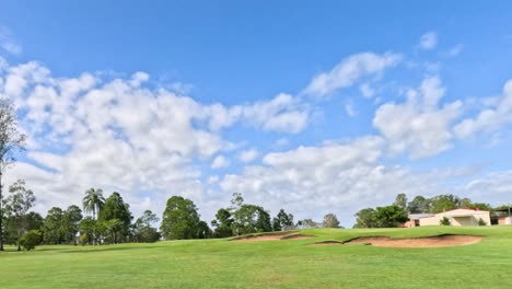 time-lapse of clouds over a tranquil golf course