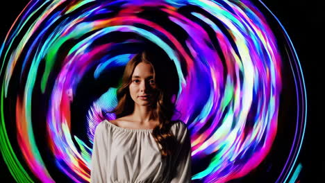 portrait of a young woman with vibrant swirling light