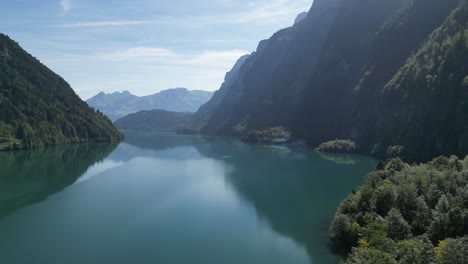 birds view of magnificent mountains located at the end of the earth world no humans living here empty and peaceful location clean healthy environment covered by plentiful trees and deep blue waters