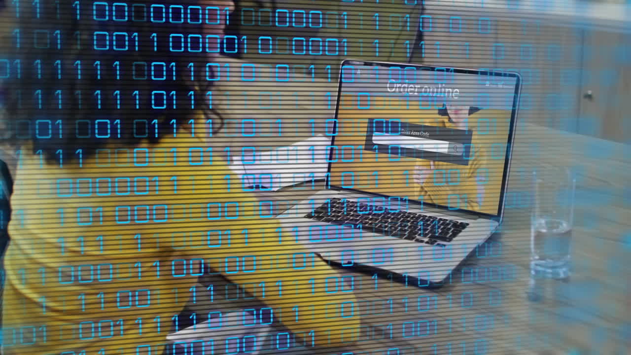 animación de código binario sobre una persona que utiliza una computadora portátil en la oficina