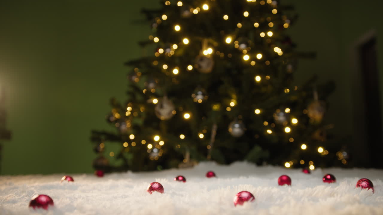 Christmas Presents Fall Down on a White Carpet