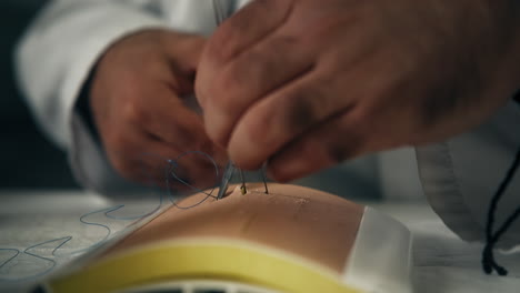 surgical training session on a mannequin