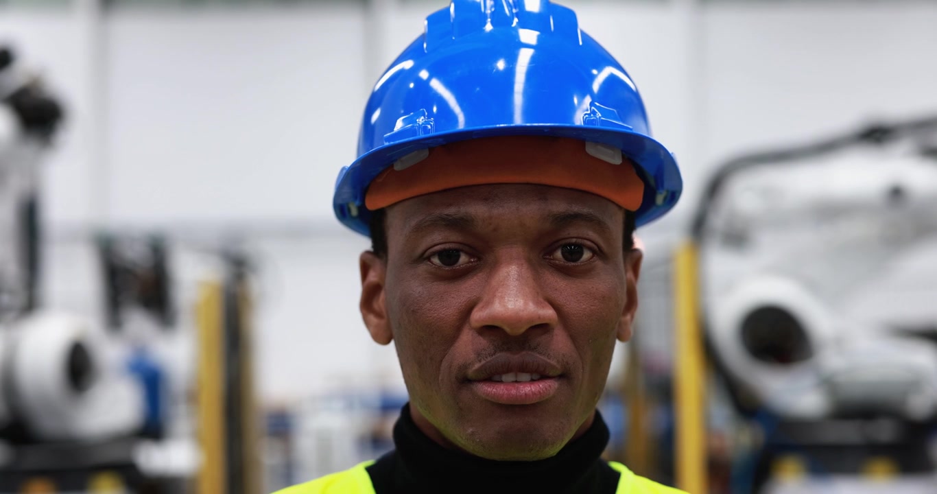 Portrait of a Young Male Factory Worker in Safety Gear