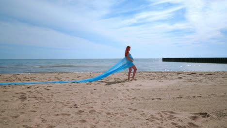 Pregnancy-concept.-Conceptual-photo-session-of-pregnant-woman-on-beach