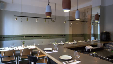 camera slider shot of empty tables and bar in a restaurant