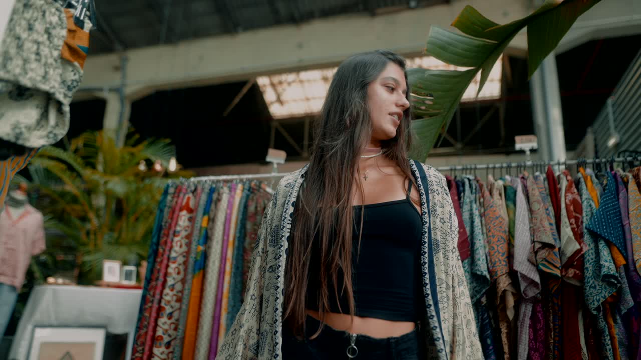 Fashionable woman at a clothing market