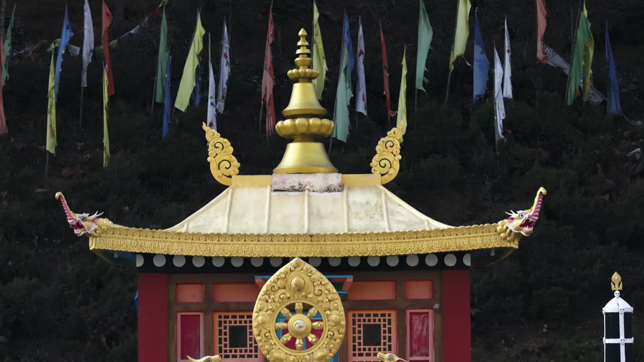 Telephoto drone shot rising in front of the Phakding Monastery, in Everest, Nepal