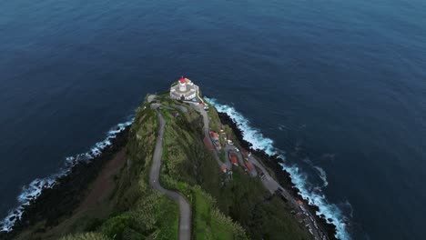colorful daylight at portugal travel destination lighthouse in azores aerial sea view