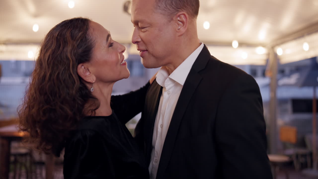 Couple dancing indoors