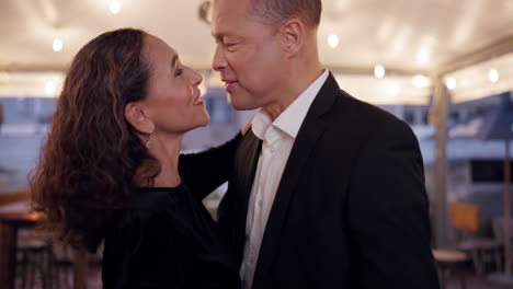 couple dancing indoors