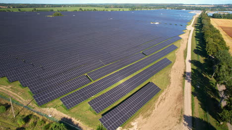 aerial view over vast solar panel farm