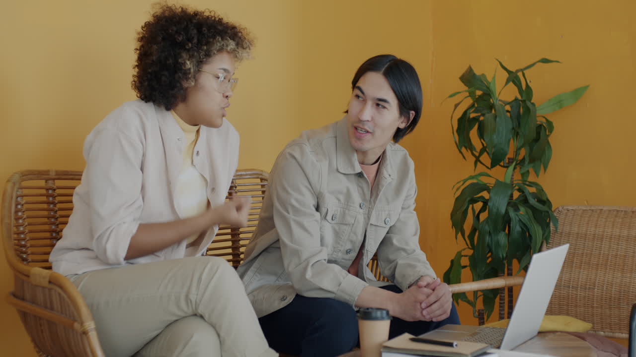 Two people having a meeting in a cafe