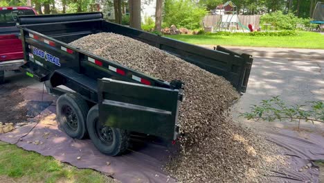 truck dump trailer delivering crush stone to client