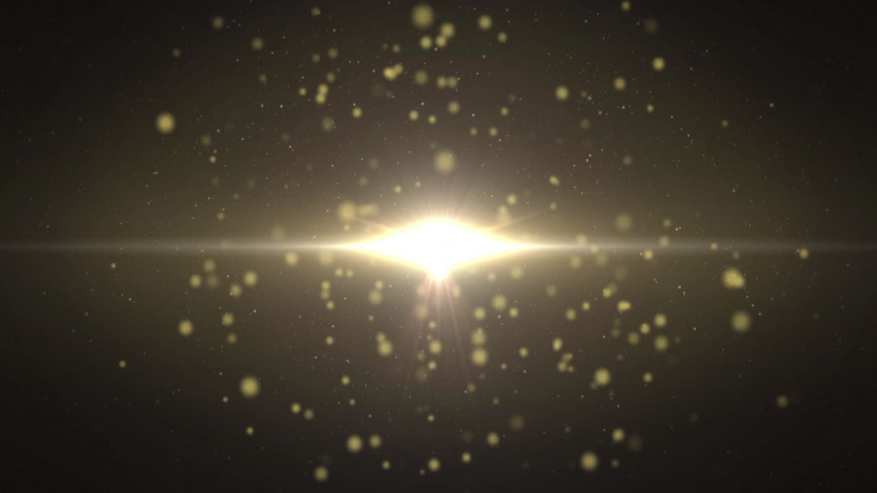 Animation of yellow spots and light trails on black background