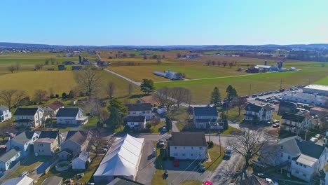 an aerial view of an amish mud sale and pennsylvania landscape in early spring