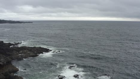 Rough-Waves-Onto-Rock-Shore-Of-Tofino-In-Vancouver-Island,-West-Coast-Canada