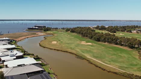 Over-houses-and-billabong-beside-golf-course-to-Sebel-Hotel