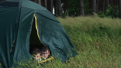 kids inside a camping tent