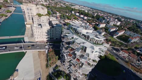 Aerial-View-and-High-Speed-Dive-on-'L'Arbre-Blanc'-in-Montpellier,-Southern-France