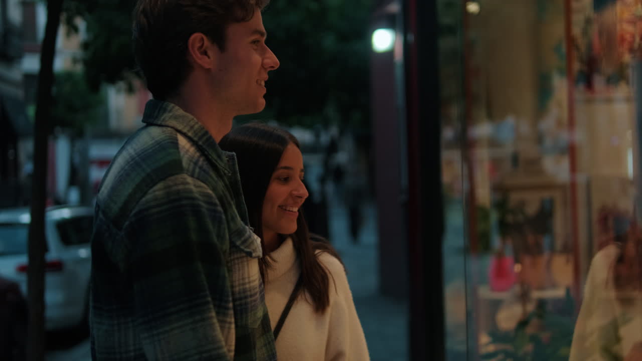 Young Couple Exploring Seville at Dusk