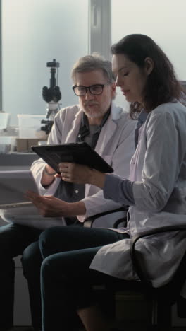 scientists collaborating in a laboratory