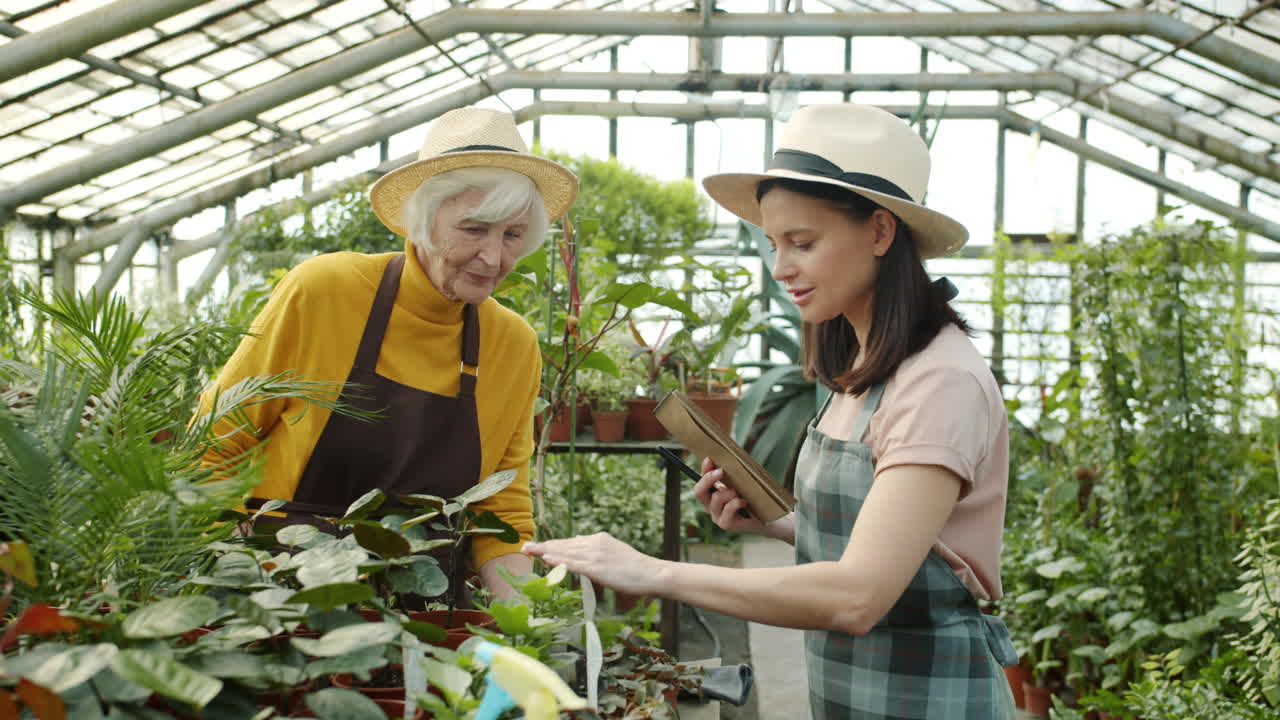 Family enjoying time in a greenhouse