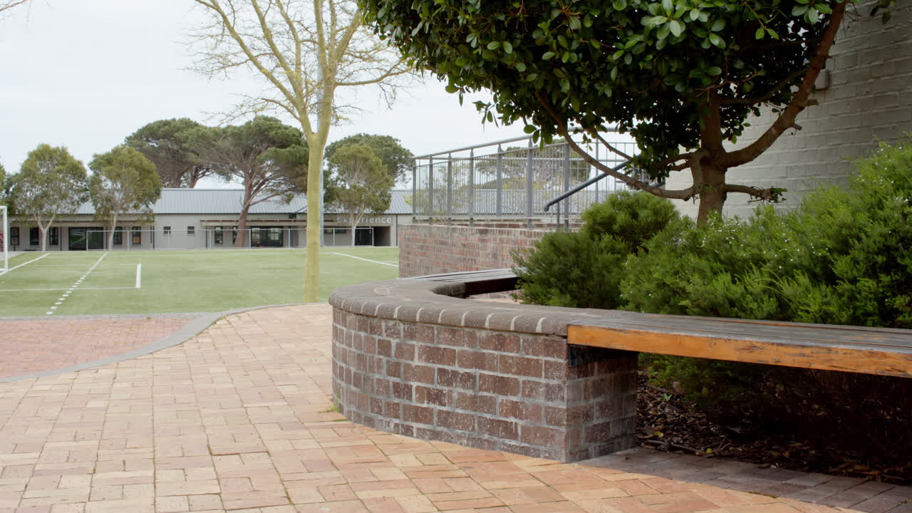 boy walking to school with backpack, looking confident and focused, copy space