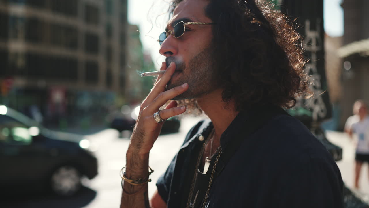 Man Smoking Cigarette Outdoors