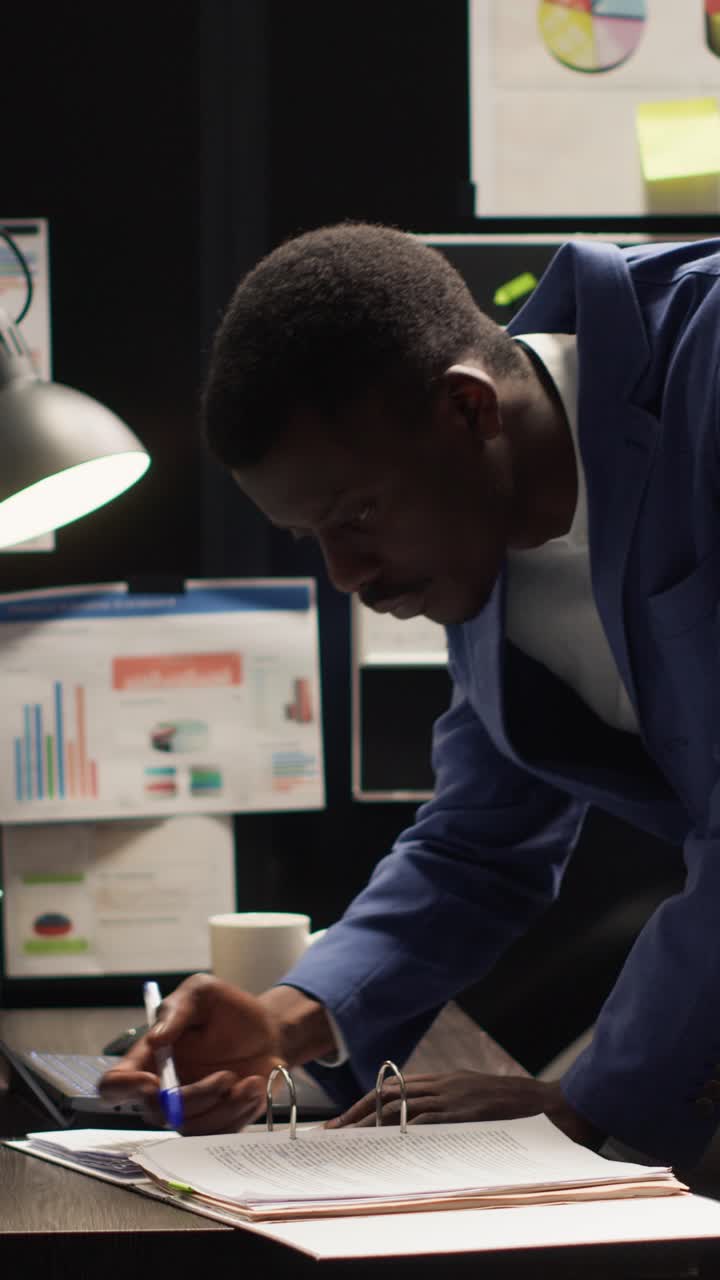 Businessman working on charts and reports in the office