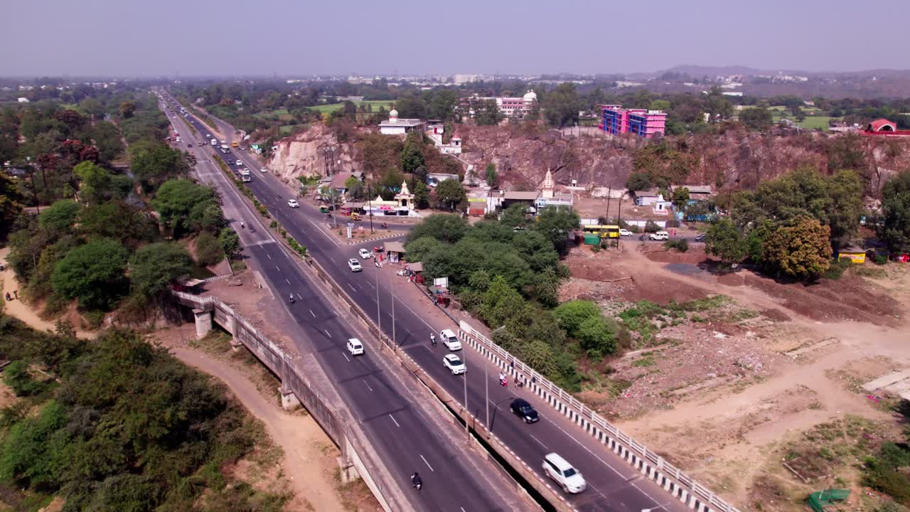 Little World School with Tilwara bridge and Jabalpur view point at tilwara, Jabalpur, Madhya Pradesh, india. day time, semi orbit, drone shot, 4k.