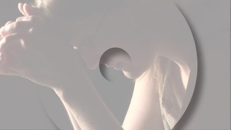 Clasping hands, woman sitting with abstract shapes and soft lighting in animation