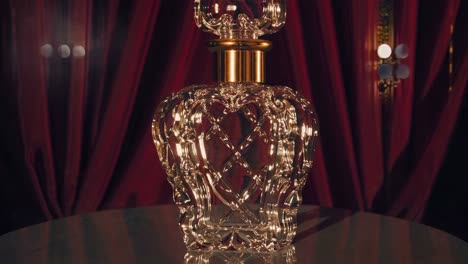 elegant crystal perfume bottle on red drapery