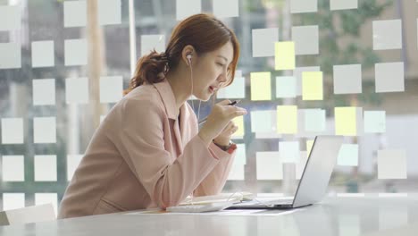 a young woman working with a laptop in a coffee shop business idea financial girl accountant