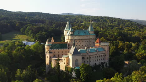 rotating drone shot of castle of spirits or bojnice castle in slovakia