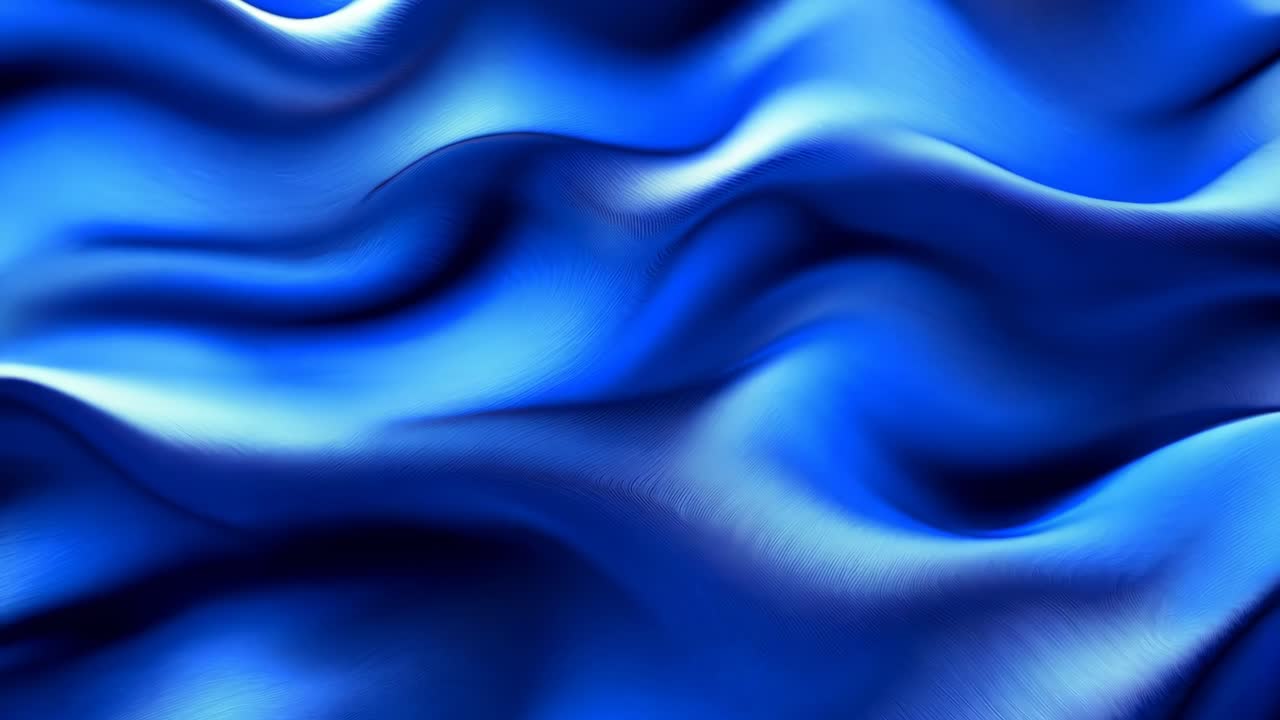 A blue wave with a lot of detail. The blue color is very vivid and the wave is very long