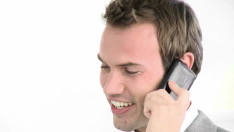 Smiling-businessman-on-phone