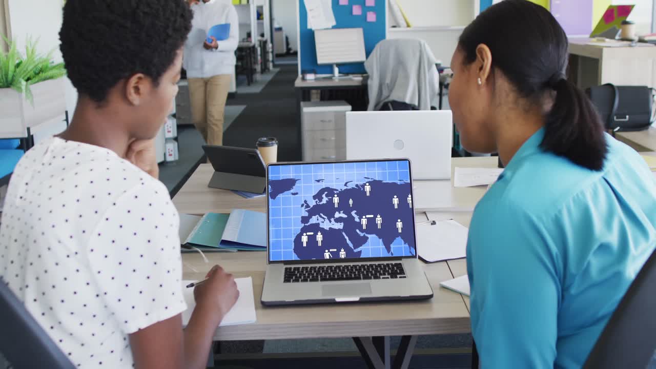 Composition of diverse women using laptop with ai chat on screen