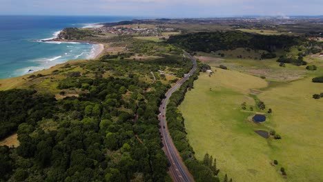 cars driving at the coast road - lennox head, nsw, australia - aerial drone