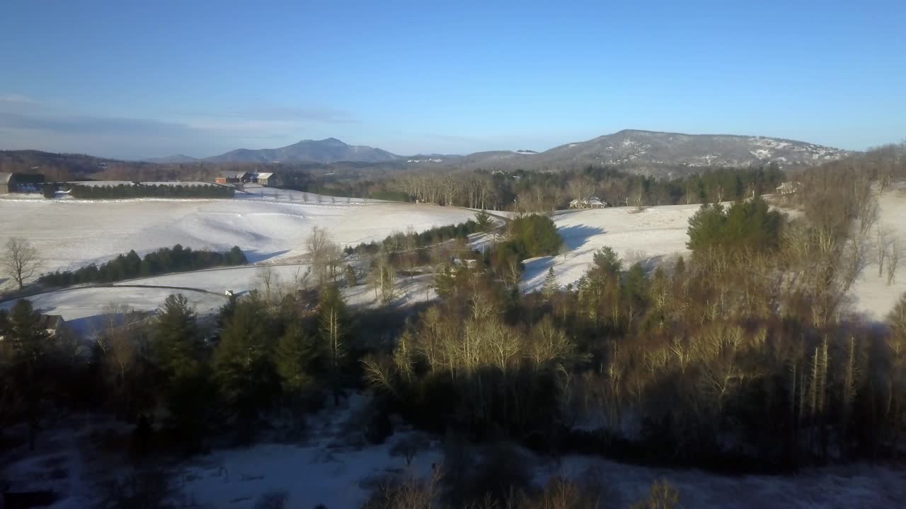 Watauga County in Snow, Grandfather Mountain in Background Aerial