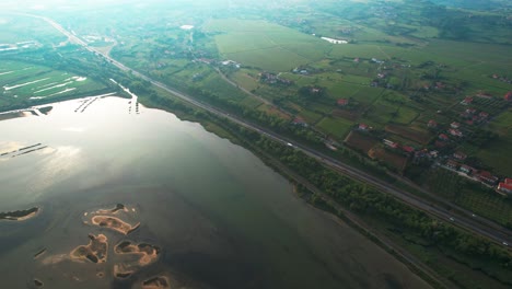 sensational top down view of koper river in slovenia, tilt up reveals horizon