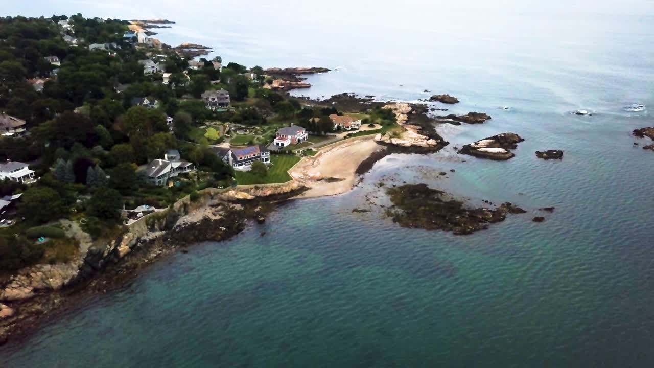Aerial of luxury beachfront homes by Tedesco Rocks in Swampscott, Massachusetts