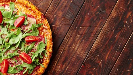 Delicious-italian-pizza-served-on-wooden-table