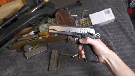 60pslomotion: ejecting a magazine from a semiautomatic 1911 pistol