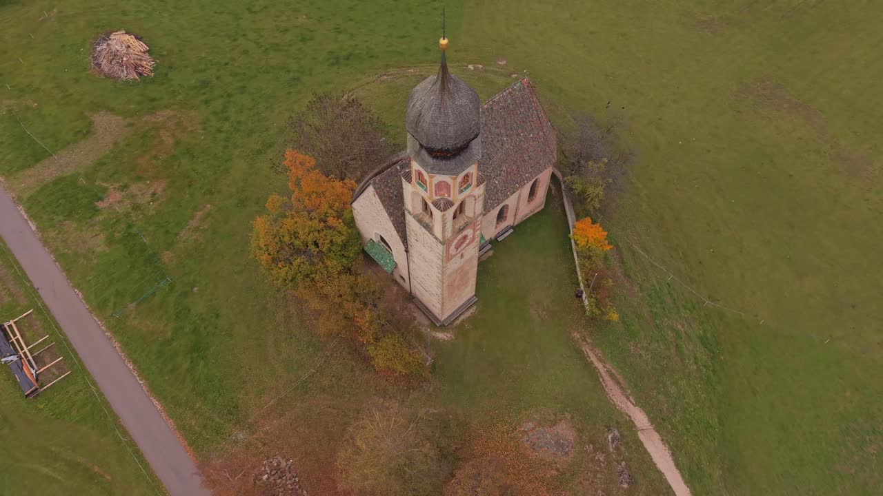 Scenic aerial of San Costantino chapel in Italy's South Tyrol region
