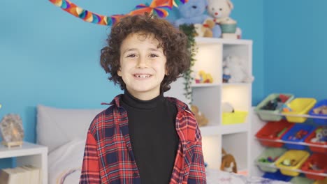 close-up portrait of happy positive boy.