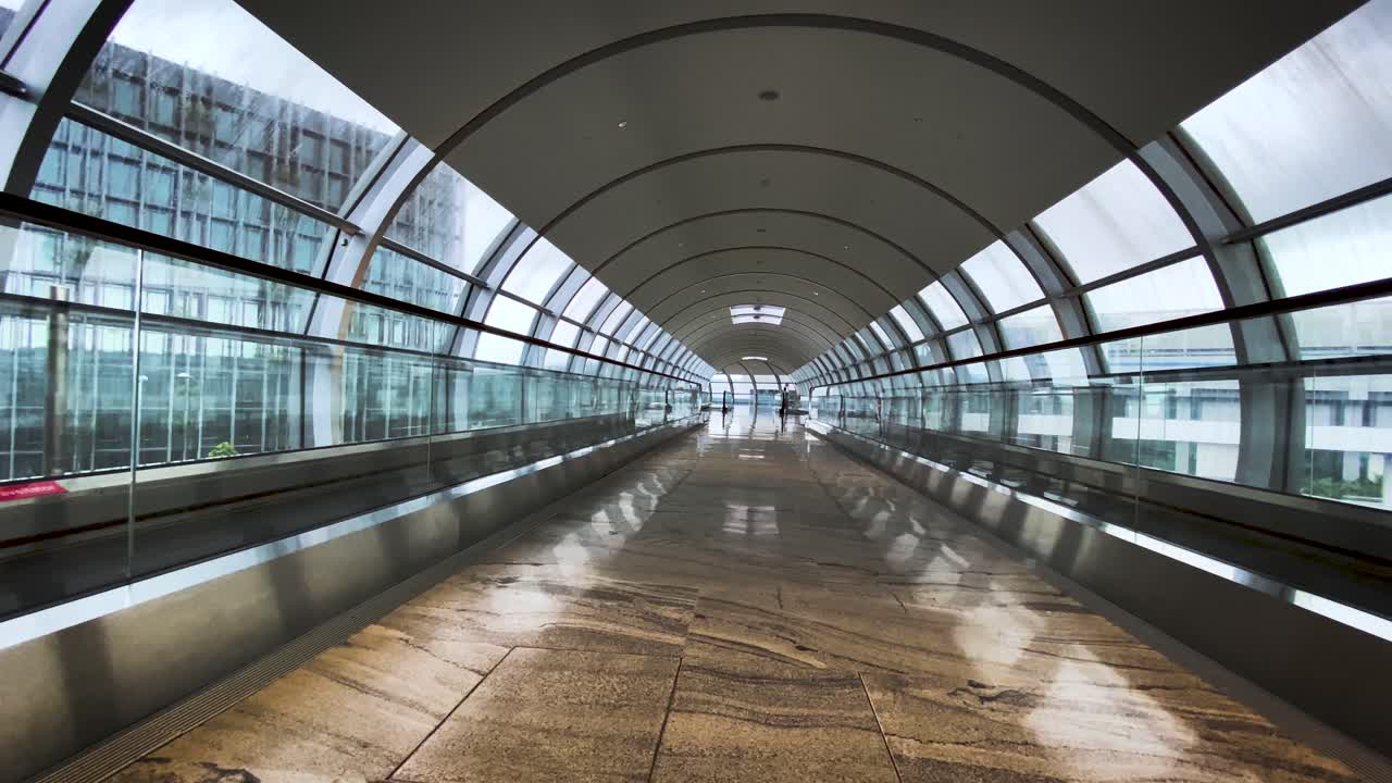 The empty Changi tunnel in Singapore during the Corona virus pandemic - wide