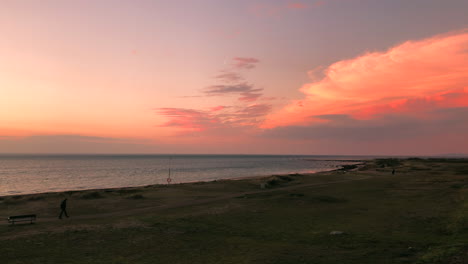 going for a beach walk early sunrise